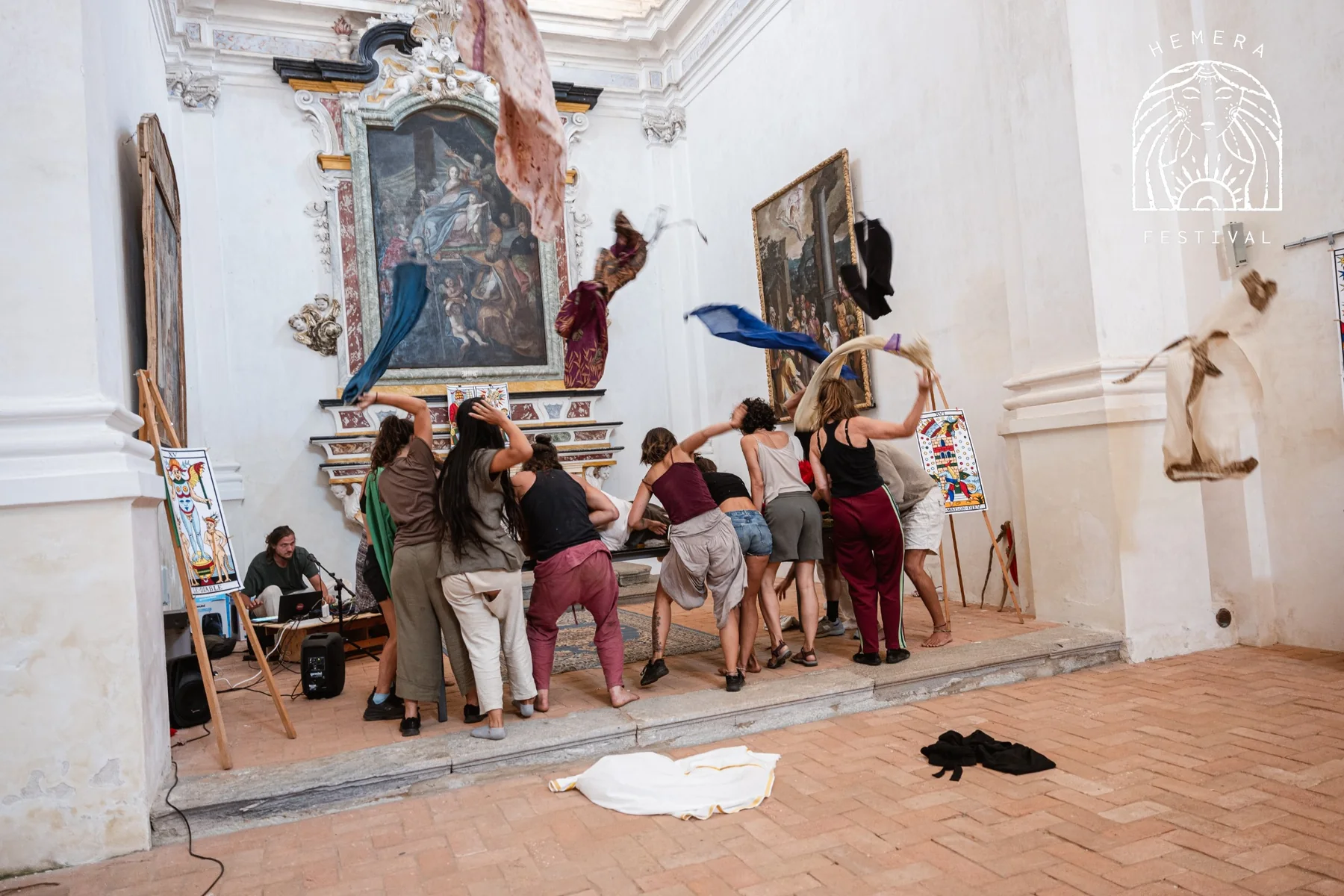 Transformative performance with moving bodies and fabric in a church space