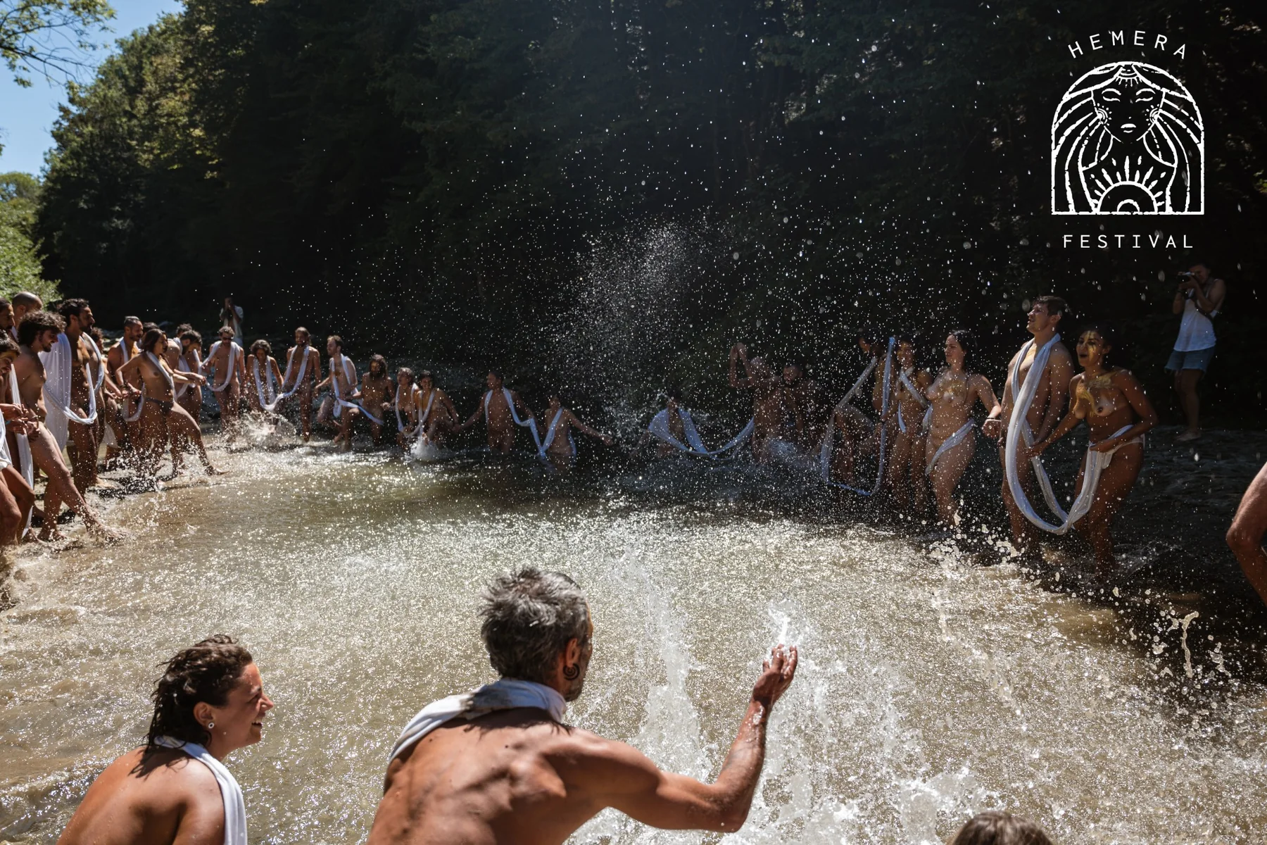 Group ritual practice in water during Hemera Festival