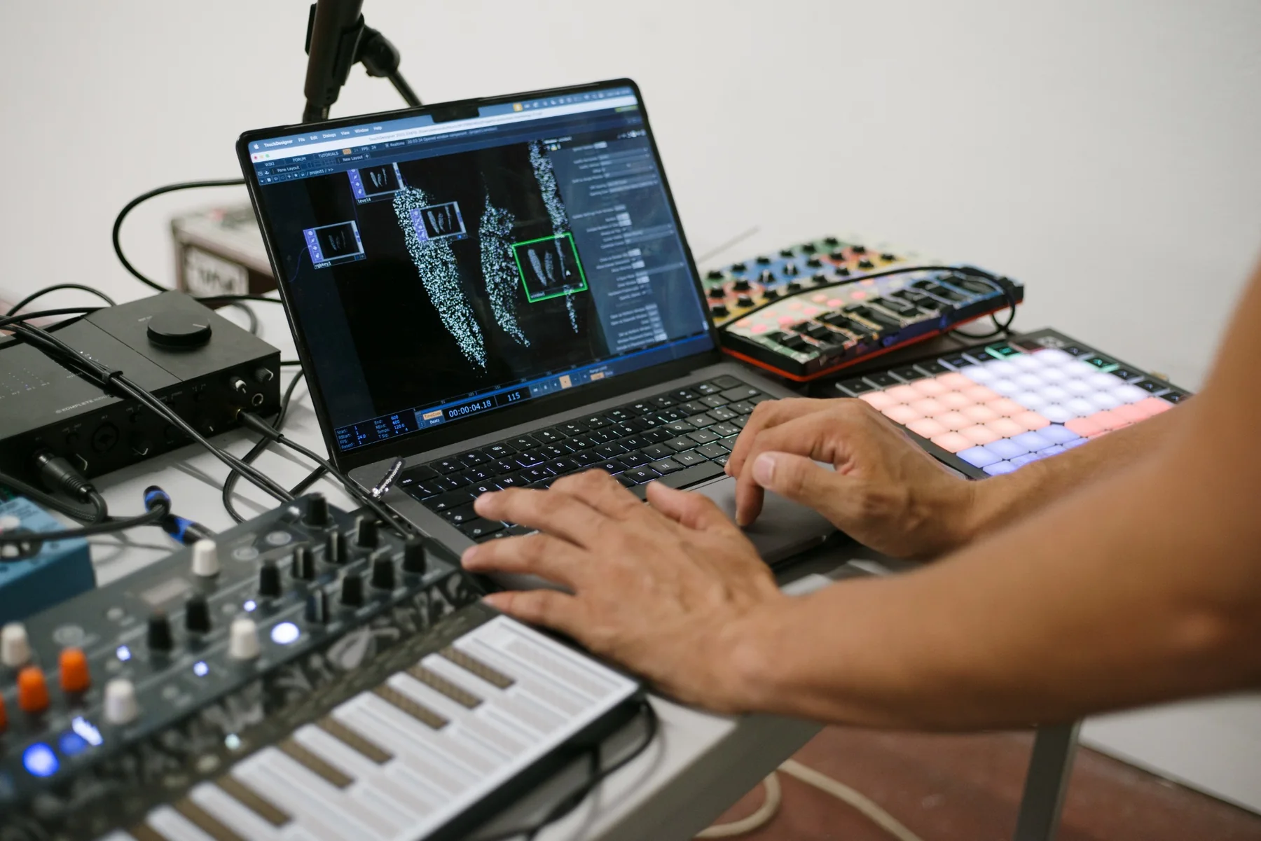 Electroacoustic live processing setup with laptop, controllers and synthesizers