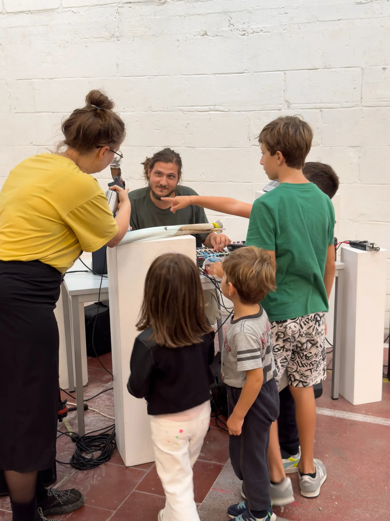 Sound research session using microphones, objects and electronics